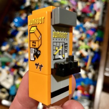 handheld Junkbot arcade machine